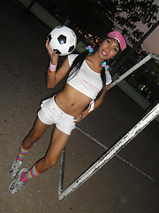 Fit and flirty Ladyboy Marry shows her soccer balls outside