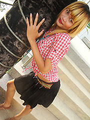 Adorable blonde Ladyboy Wa takes self shot pics