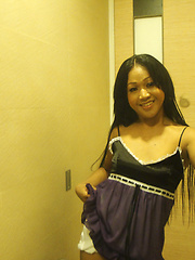 Dark and small tit Ladyboy Kem flashes inside and outside