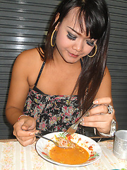Teen Ladyboy Ping fucks herself with a big green cucumber