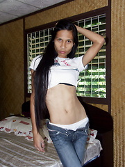Very skinny Thai ladyboy stripping for us